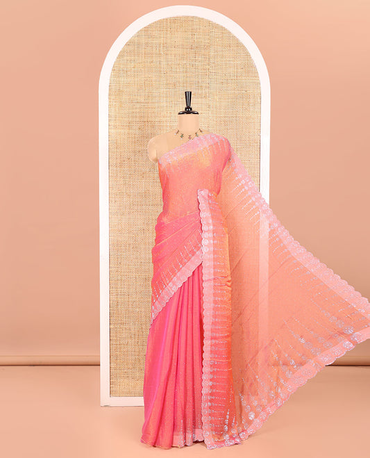 Pink Fendi Chiffon Saree Dazzled With Glittering Swarovski Stones Struck All Over Its Body, Complemented With Scallop Swarovski Stone Work Border, Swarovski Stone Work Pallu, And A Matching Swarovski Stone Work Blouse