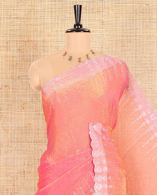 Pink Fendi Chiffon Saree Dazzled With Glittering Swarovski Stones Struck All Over Its Body, Complemented With Scallop Swarovski Stone Work Border, Swarovski Stone Work Pallu, And A Matching Swarovski Stone Work Blouse