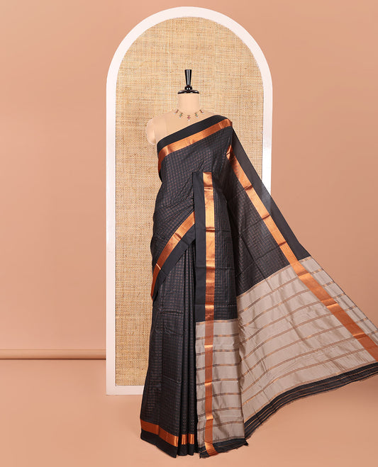 Black Semi-Soft Silk Saree Elevated Up with Plus-Shaped Buttas All Over the Body, Highlighted with Zari Border, Complemented by Contrast Pallu of Zari Stripes, and Paired with a Contrast Blouse