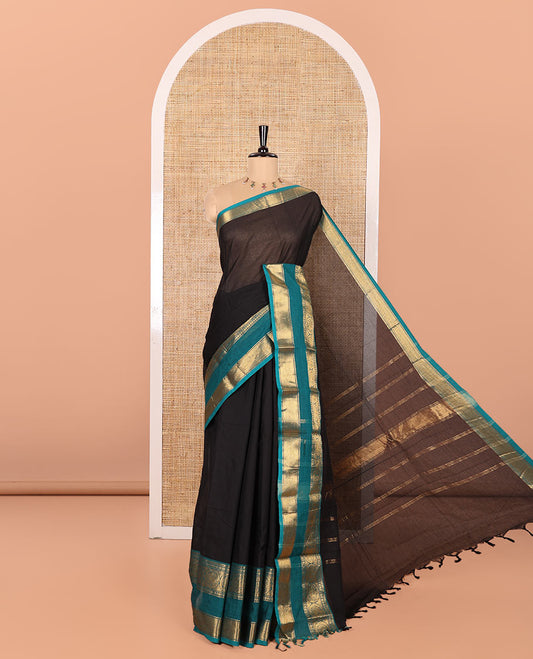Black Plain Chettinad Cotton Saree, Complemented by Contrast Traditional Zari Rettai Pettu Border of Round Peacock Designs, Gleaming Pallu of Stripes, and Paired with a Matching Blouse
