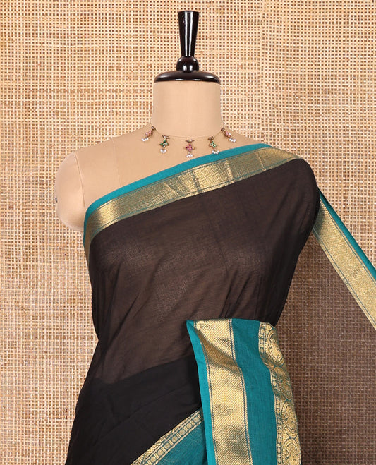 Black Plain Chettinad Cotton Saree, Complemented by Contrast Traditional Zari Rettai Pettu Border of Round Peacock Designs, Gleaming Pallu of Stripes, and Paired with a Matching Blouse