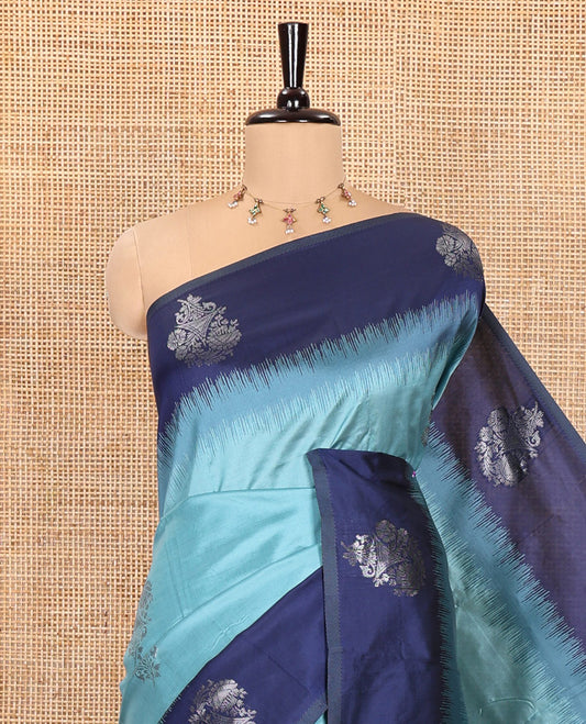 Blue Kanchi Silk Saree, Adorned with Zari Buttas All Over Its Body, Complemented by a Contrast Border of Unique Buttas, Pallu Grandly Woven with Intricate Designs, and Paired with a Contrast Blouse
