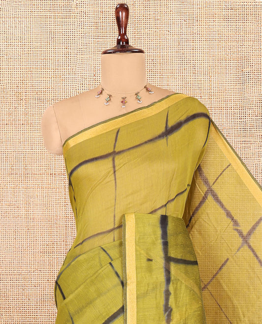 Green Linen Cotton Saree, Adorned with Shibori Checks, a Subtle Piping Border, Geometric Pallu, and a Matching Blouse