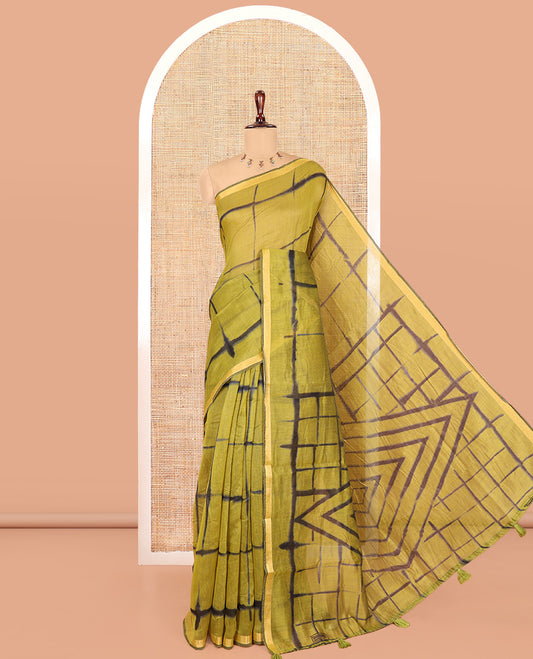 Green Linen Cotton Saree, Adorned with Shibori Checks, a Subtle Piping Border, Geometric Pallu, and a Matching Blouse
