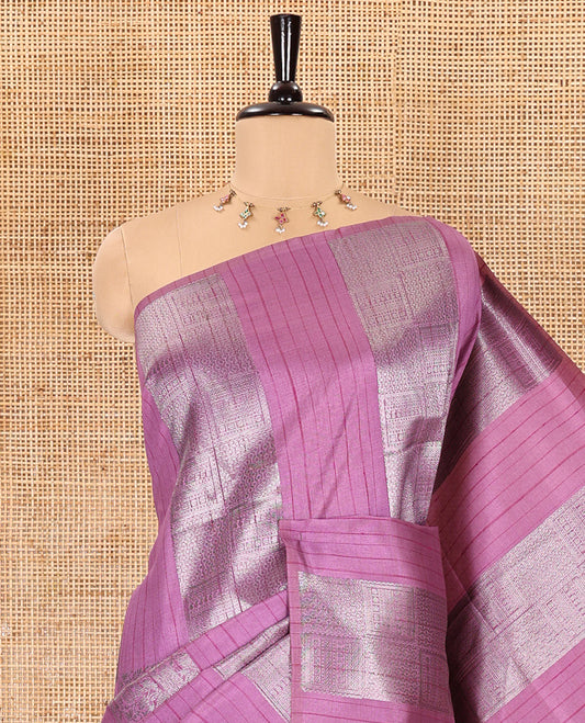 Borderless, pink striped, and zari traditional kanchi motifs fancy tussar saree, intricately zari-woven pallu, and a matching zari buttas woven blouse