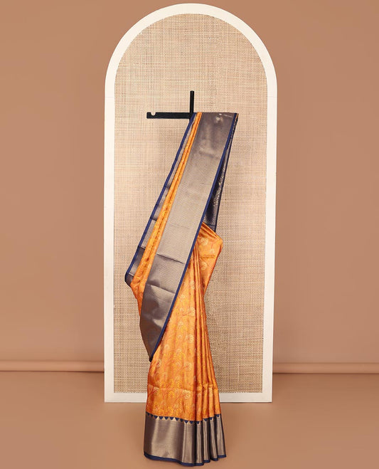 Orange floral design soft silk saree with contrast temple, checked border & floral design pallu