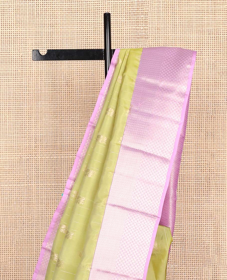 Green annam chakram buttas Vasundhara silk mix saree, contrast vanki & thilakam border & pallu of geometric designs