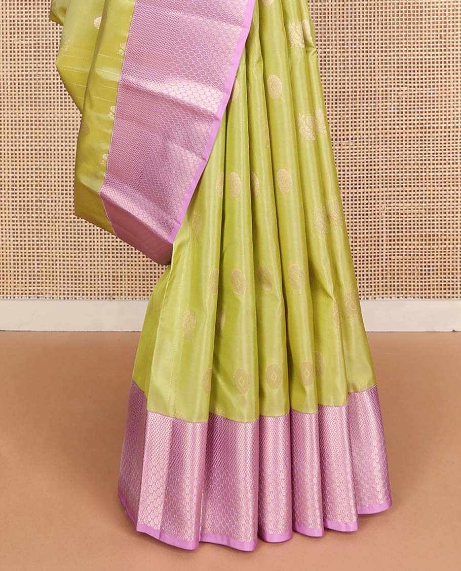 Green annam chakram buttas Vasundhara silk mix saree, contrast vanki & thilakam border & pallu of geometric designs