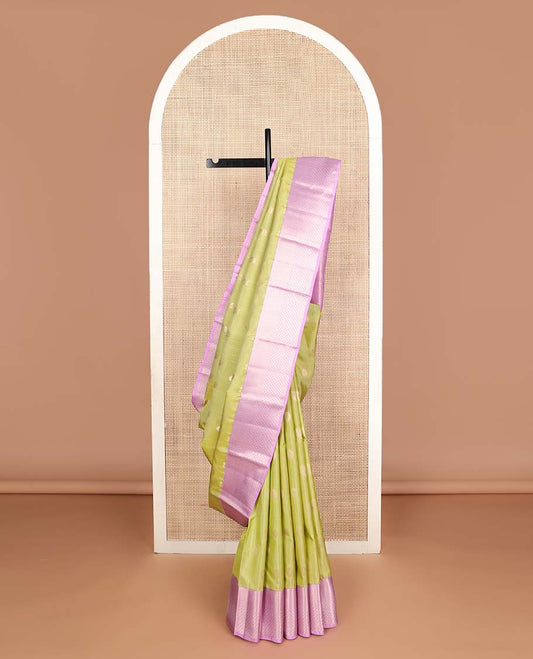 Green annam chakram buttas Vasundhara silk mix saree, contrast vanki & thilakam border & pallu of geometric designs