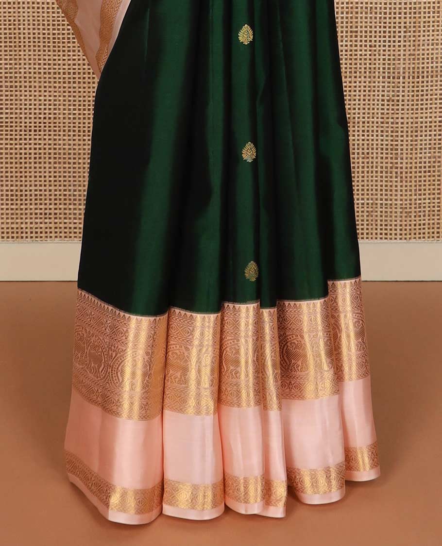 Green zari buttas Vasundhara silk mix saree, contrast rettai pettu border of rekku, kathir, round yaali, and zari designs, and vanki design pallu