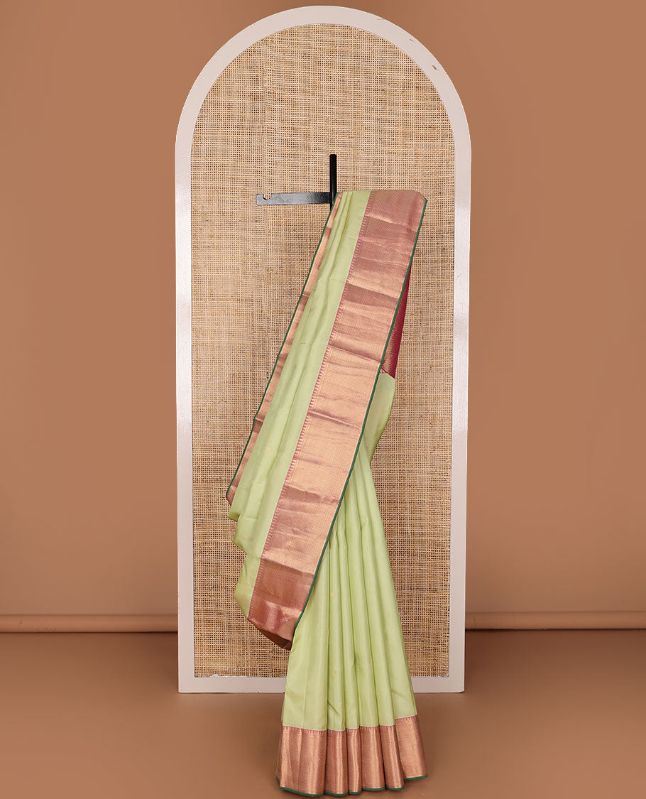 Pale green zari buttas silk saree, contrast jaal & annam chakram design pallu & border of rekku,kathir & then kuli kann