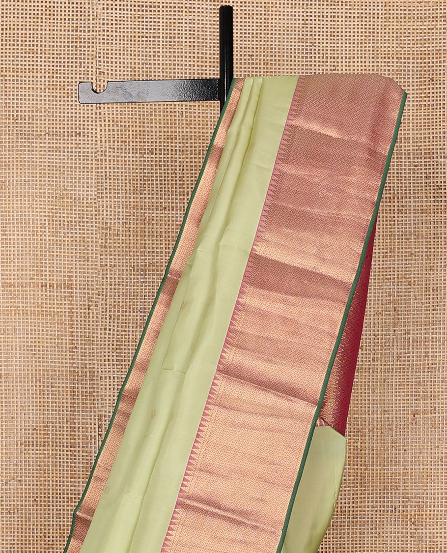 Pale green zari buttas silk saree, contrast jaal & annam chakram design pallu & border of rekku,kathir & then kuli kann