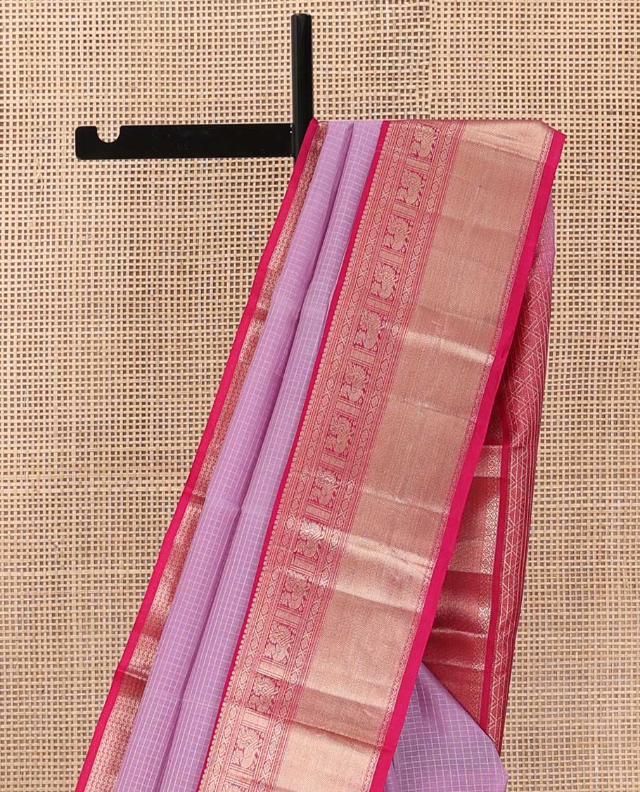 Pink zari striped silk saree, contrast border of salngai, cross kamalam, neli, and mayil designs and jaal pallu