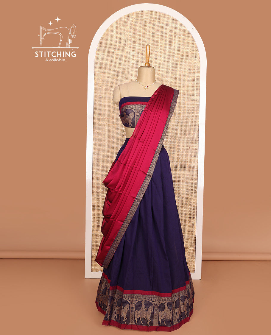 Ink blue cotton half-saree, plain with contrast man on the horse motifs bordered skirt, matching blouse, and contrast dhavani