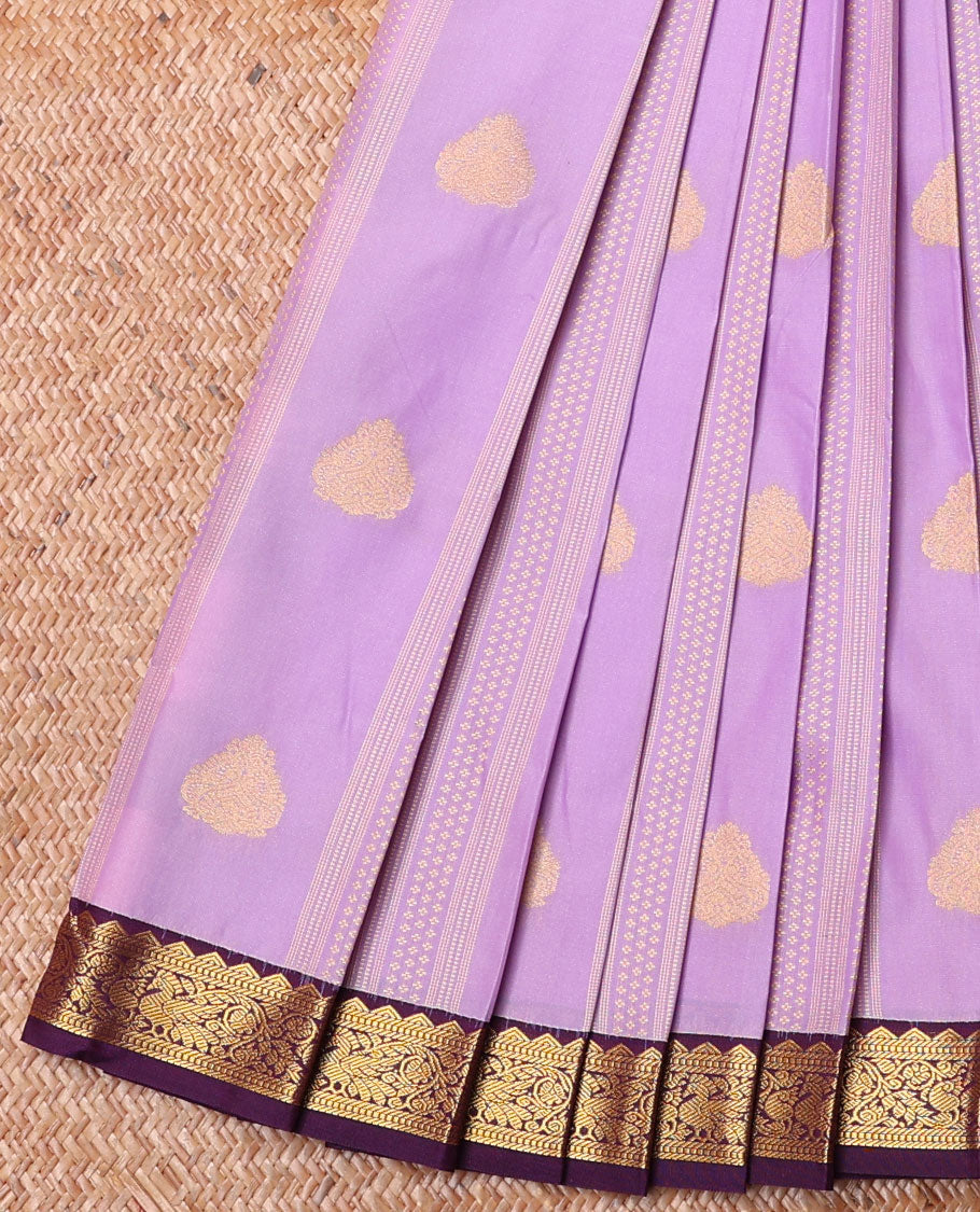 Lavender Budget Silk Saree, Majestically Detailed with Zari Buttas on Its Body, Complemented by a Traditional Zari Border of Peacocks, Geometric Textured Pallu, and Paired with a Contrast Blouse
