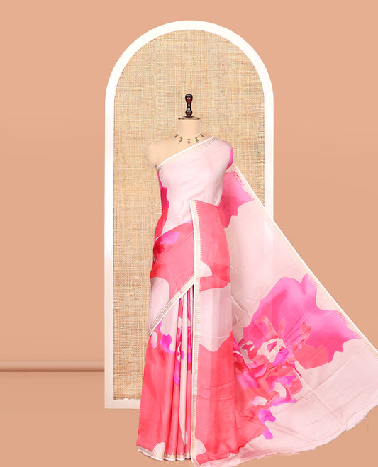 Dusky Pink Moss Chiffon Saree Features an Abstract Print, a Gold Zari Border, Printed Pallu, and Matching Blouse