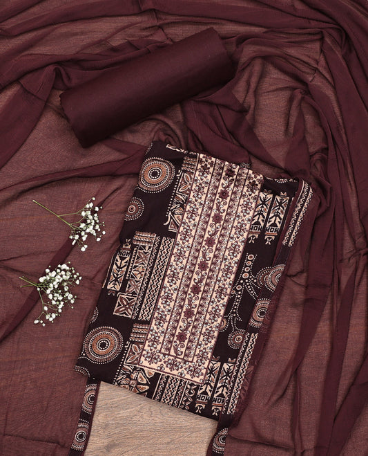Brown Material Chudidar Set, Accentuated with Floral and Geometric Print and Neck Embroidery on Rayon Top, a Plain Rayon Bottom, and Paired with a Matching Chiffon Dupatta