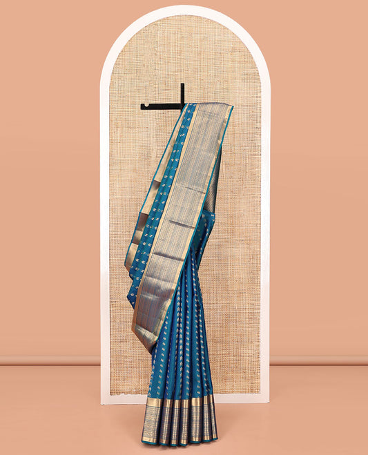 Blue Vasundhara Lite Silk Mix Saree, Steeped with the Richness of Zari Buttas All Over Its Body, Highlighted by Zari Border of Manga, Muthu, and Kodi Visiry Designs, Grand Jaal Pallu and Paired with a Matching Blouse