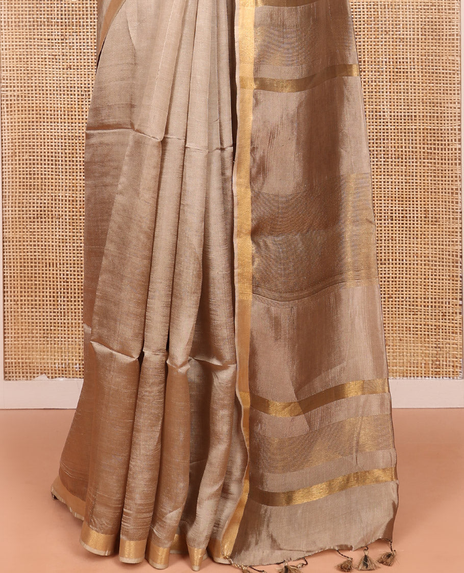 Pale Brown Plain Banana Pith Saree, Subtly Made Zari Bavanji Border, Pallu Featuring Zari Stripes, and Paired with a Matching Blouse