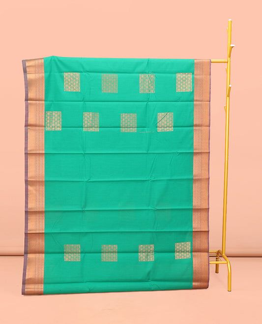 Green Semi-Silk Cotton Saree, Charmingly Accented with Zari Buttas All Over Its Body, Complemented by a Contrast Traditional Zari Design Border, Pallu of Star Design, and Paired with a Contrast Blouse