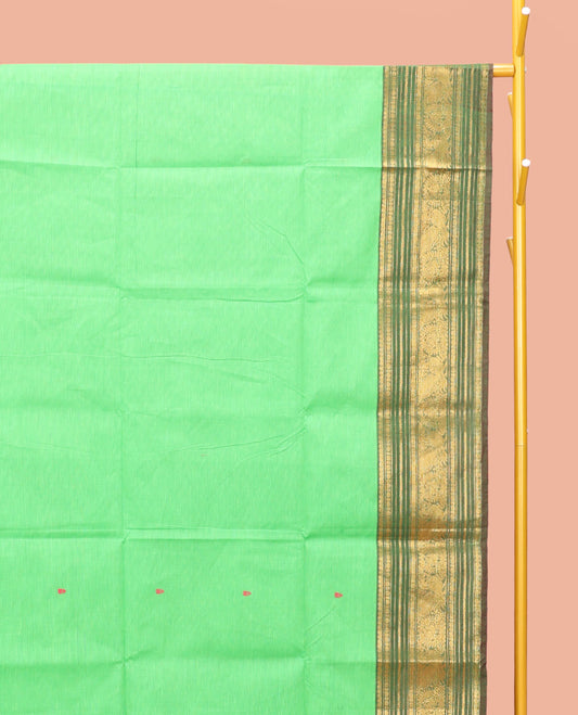 Green Chettinad Cotton Saree, Detailed with Buttas All Over Its Body, Complemented by a Contrast Traditional Zari Design Border, Pallu of Stripes and Buttas, and Paired with a Matching Blouse