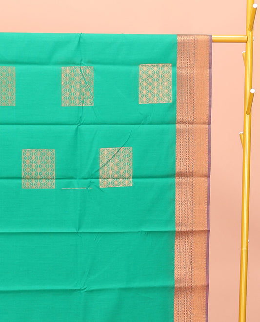 Green Semi-Silk Cotton Saree, Charmingly Accented with Zari Buttas All Over Its Body, Complemented by a Contrast Traditional Zari Design Border, Pallu of Star Design, and Paired with a Contrast Blouse