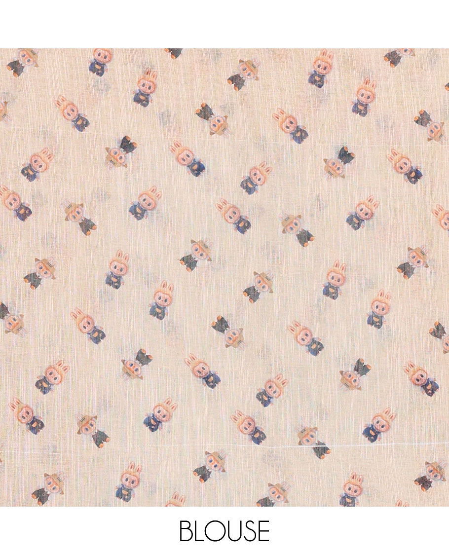 Borderless light orange labubu toy motifs printed linen cotton saree with a matching labubu toy s printed blouse