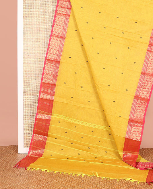 Yellow Chettinad Cotton Saree Adorned with Paisley Buttas, Complemented by a Contrast Traditional Zari Design Woven Border, and a Pallu of Stripes and Paisley Designs