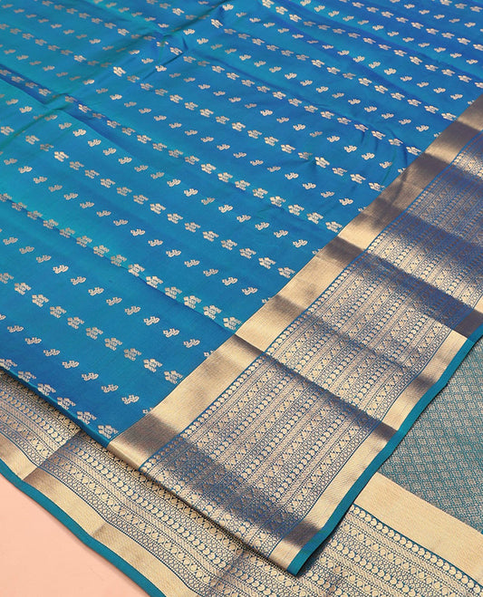 Blue Vasundhara Lite Silk Mix Saree, Steeped with the Richness of Zari Buttas All Over Its Body, Highlighted by Zari Border of Manga, Muthu, and Kodi Visiry Designs, Grand Jaal Pallu and Paired with a Matching Blouse
