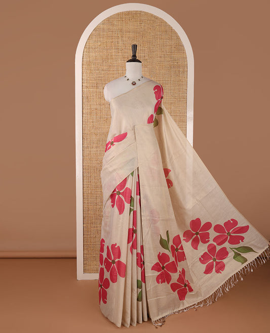 Borderless cream printed onam tissue silk saree features hot pink color five-petal flower & leaf motifs print, matching floral print blouse