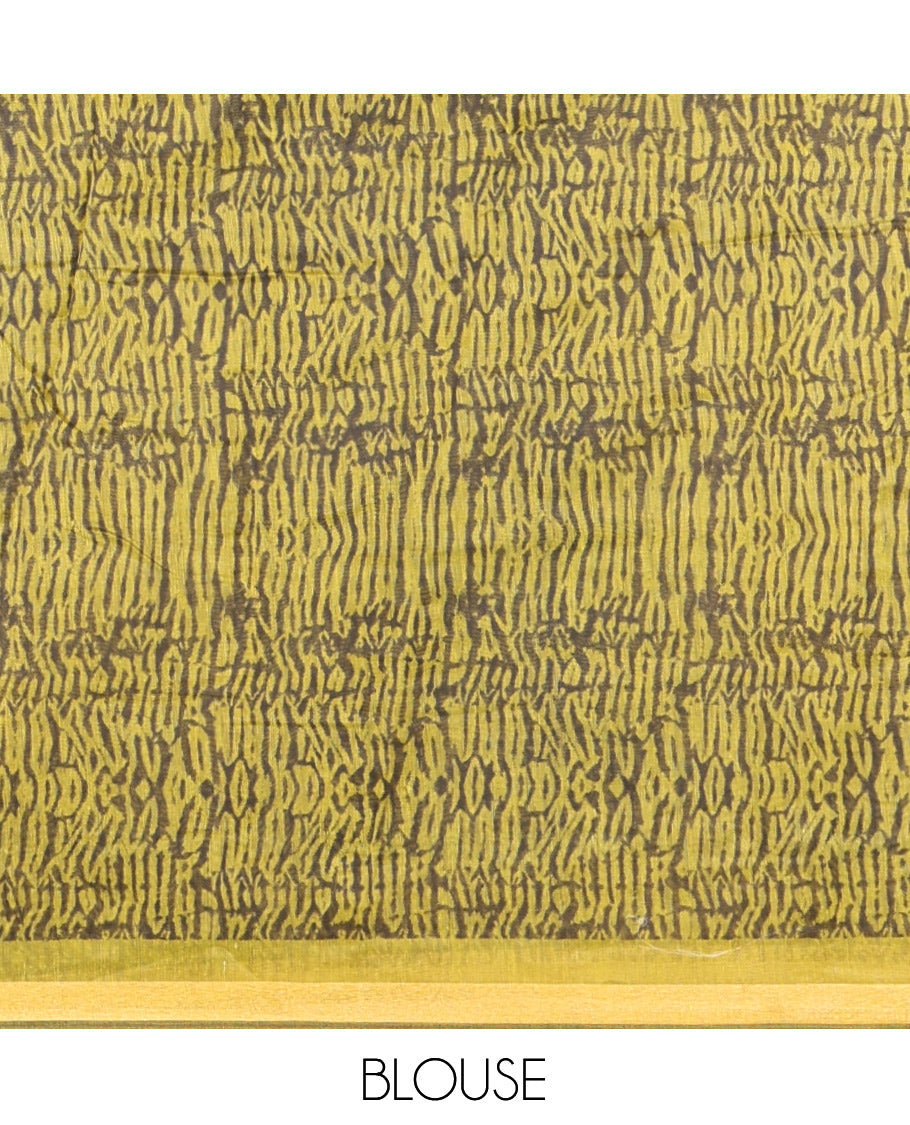 Green Linen Cotton Saree, Adorned with Shibori Checks, a Subtle Piping Border, Geometric Pallu, and a Matching Blouse
