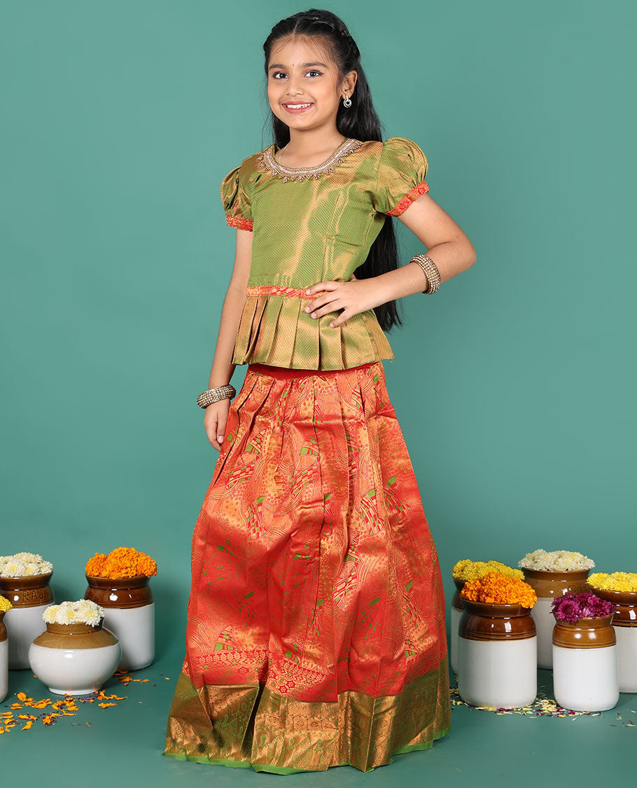 Red readymade art silk pavadai, jacquard & contrast zari border skirt & contrast jacquard round neck embroidered puff-sleeve blouse