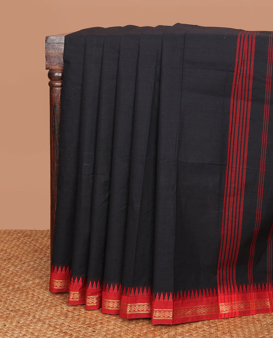 Black plain Chettinad cotton saree, contrast temple border of diamond motifs & red thread striped pallu
