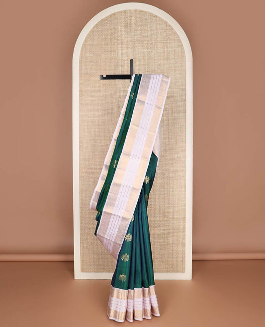 Green floral butta silk saree, contrast border of rekku,rudraksham,floral,banaras & mayil, & ogee patterned pallu