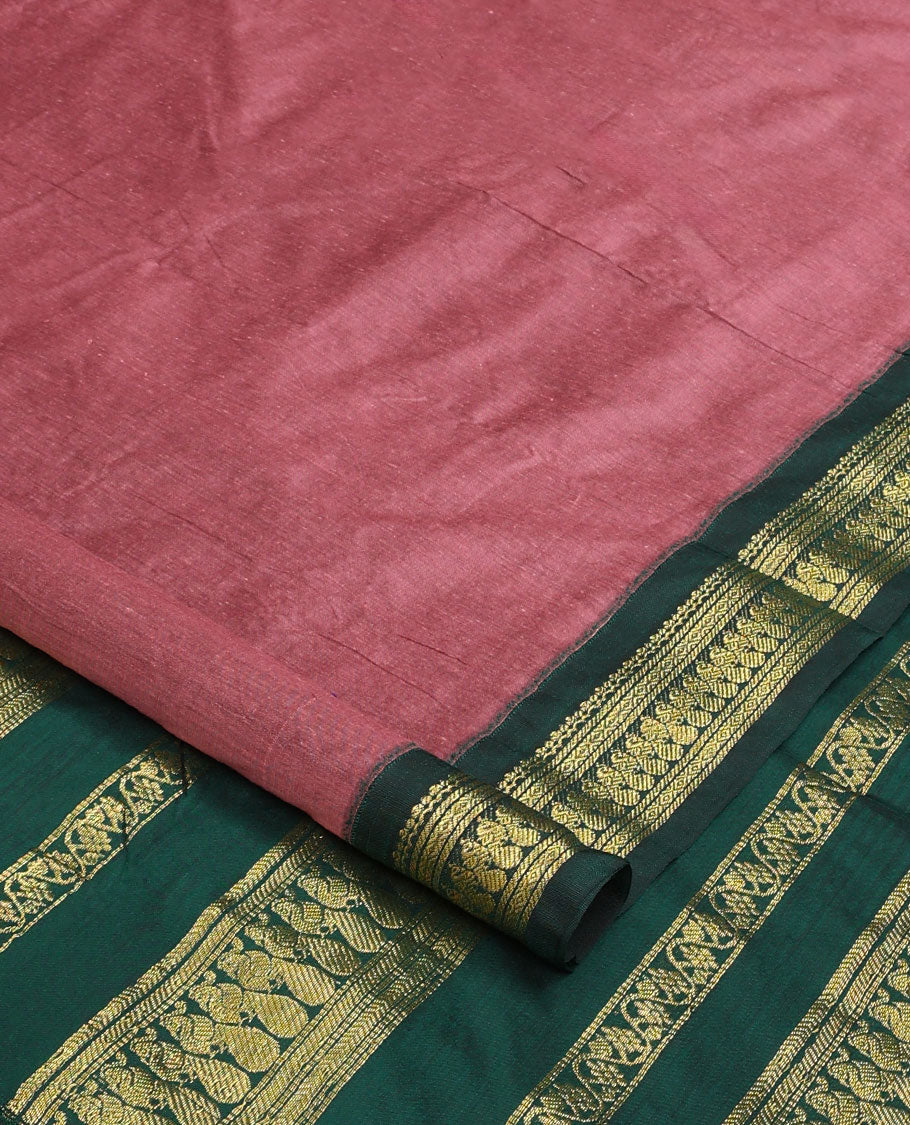Rosewood pink buttas nine-yard cotton saree, contrast traditional zari border, and pallu steeped with traditional designs