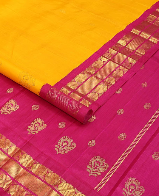 Yellow buttas kancheepuram silk saree with contrast korvai border of paun, banaras design & zari design pallu