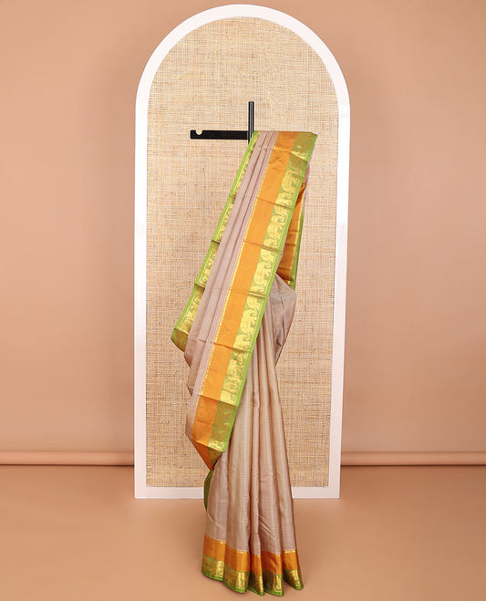 Mauve striped kancheepuram silk saree with contrast border of thilakam mokku, yanaai, banaras design & striped pallu