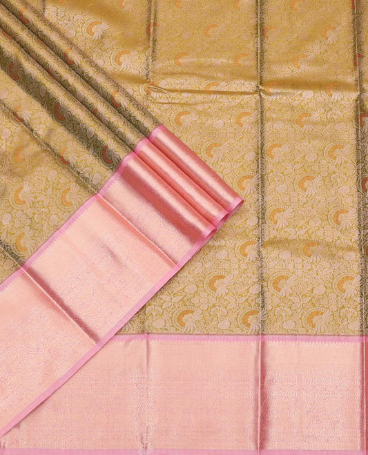Green Art Silk Pavadai Material Set, Masterfully Woven with Floral Jacquard Designs on Its Skirt, Complemented by a Contrast Traditional Zari Design Border, and Paired with a Contrast Blouse