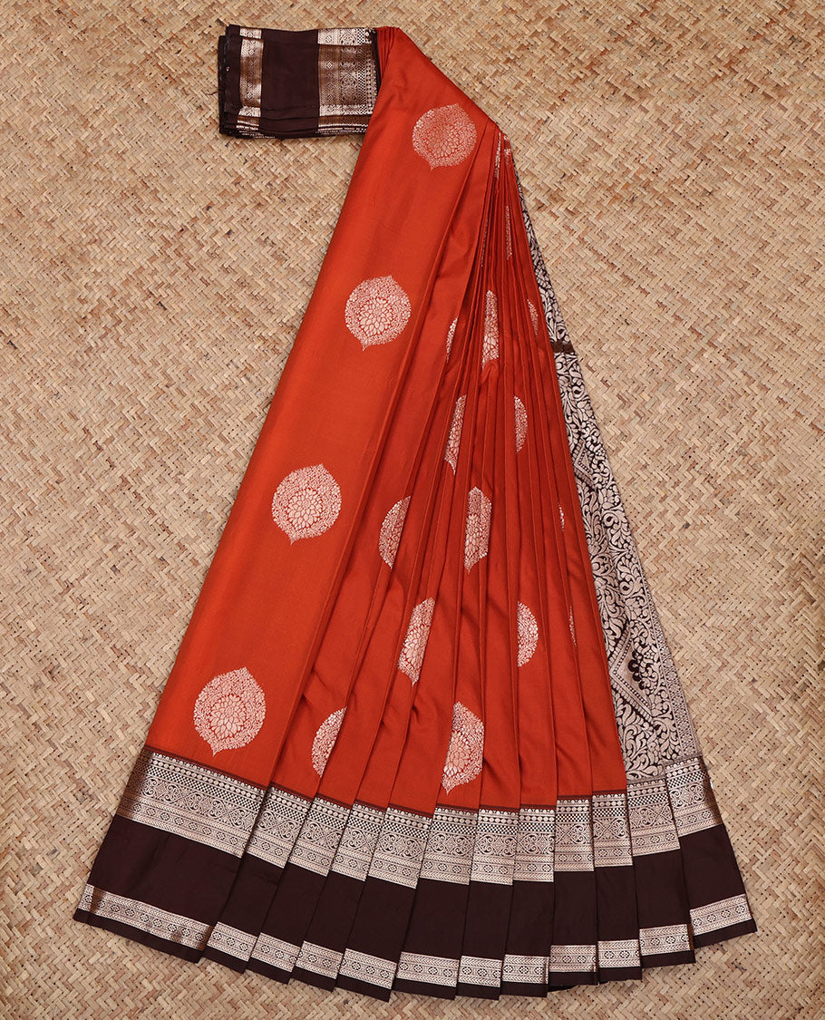 Rust Budget Silk Saree, Embellished with Zari Buttas All Over Its Body, Complemented by a Contrast Traditional Zari Design Rettai Pettu Border, Intricately Designed Pallu, and Paired with a Contrast Blouse