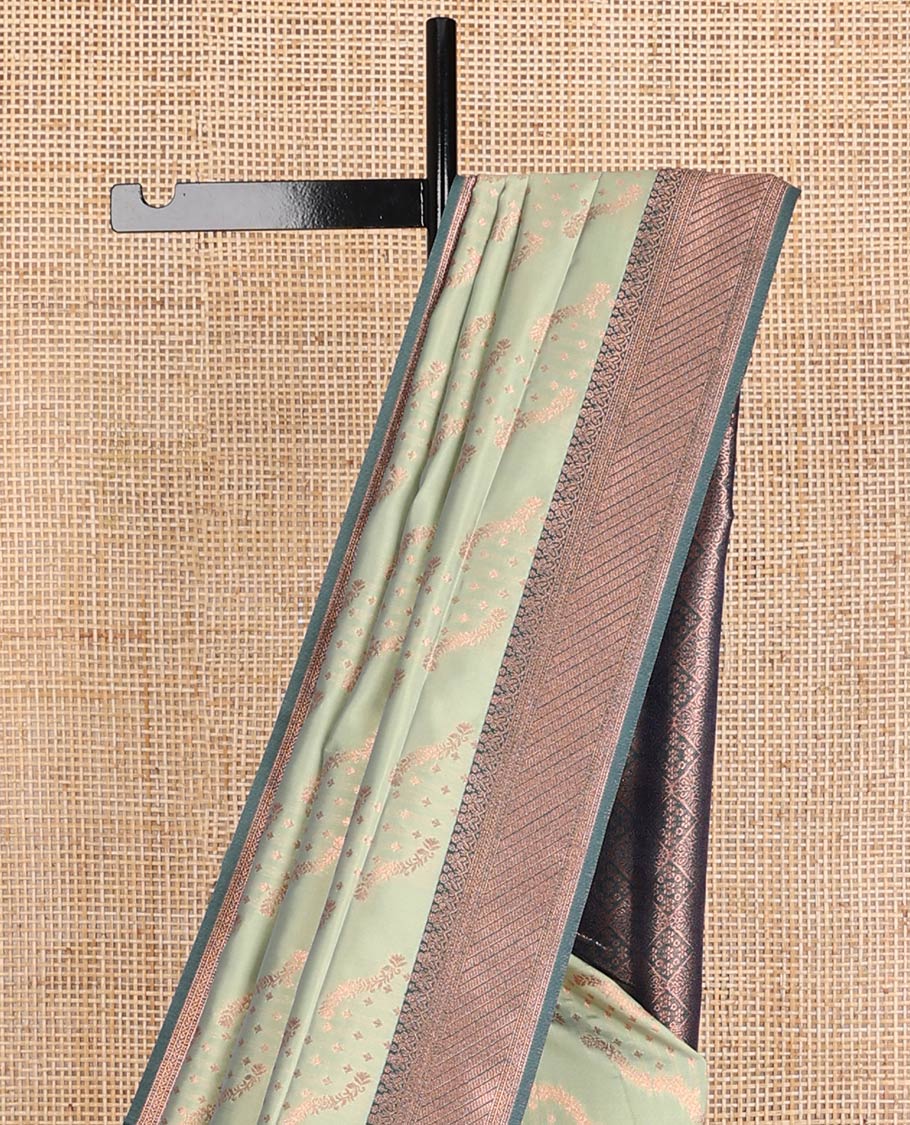 Sage green butter silk saree with floral zari designs, contrast traditional zari design & jaal pallu