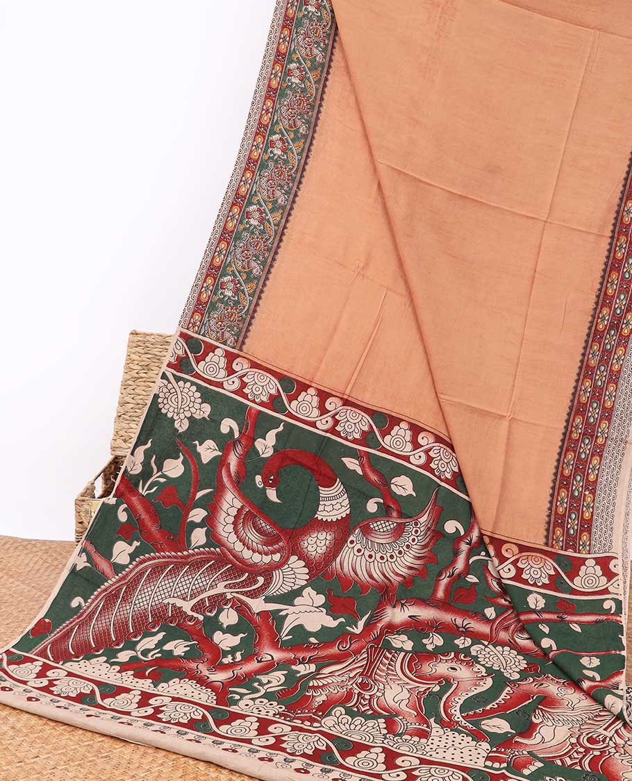 Peach machine-printed kalamkari cotton saree with contrast intricate design border & floral, peacock design pallu