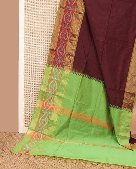 Maroon plain poly cotton saree, contrast ikat zari border, and pallu of stripes