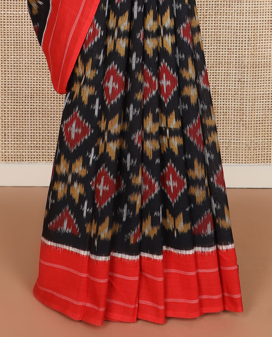 Black floral-geometric ikkat cotton saree, contrast striped border & diamond-patterned pallu