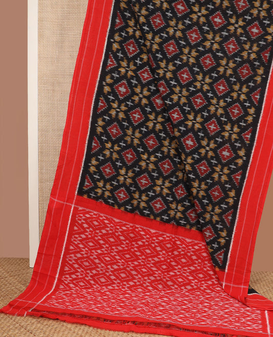 Black floral-geometric ikkat cotton saree, contrast striped border & diamond-patterned pallu