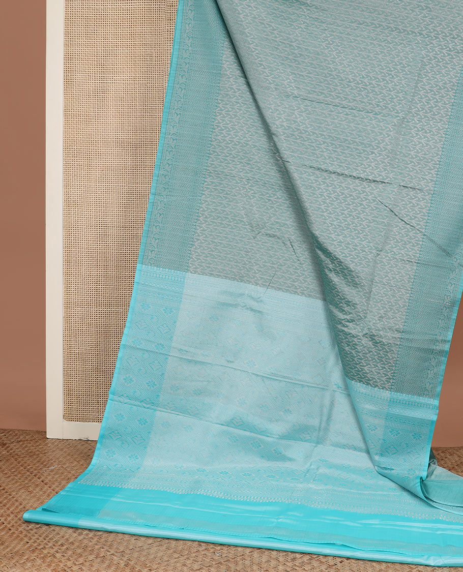 Blue jacquard semisilk cotton saree, contrast traditional border, and jaal pallu