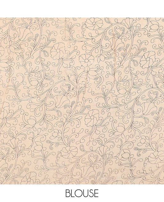 Green floral vine and bird machine-printed Kalamkari cotton saree, contrast peacock border, and pallu of floral-geometric designs