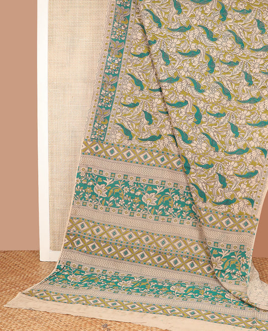 Green floral vine and bird machine-printed Kalamkari cotton saree, contrast peacock border, and pallu of floral-geometric designs
