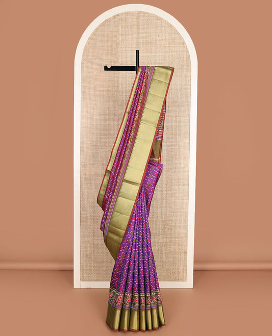 Purple motif semi-banaras patola silk saree, contrast temple border of ikkat designs, and pallu of floral and geometric design