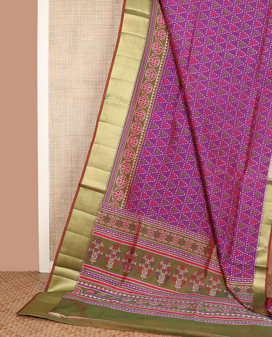 Purple motif semi-banaras patola silk saree, contrast temple border of ikkat designs, and pallu of floral and geometric design