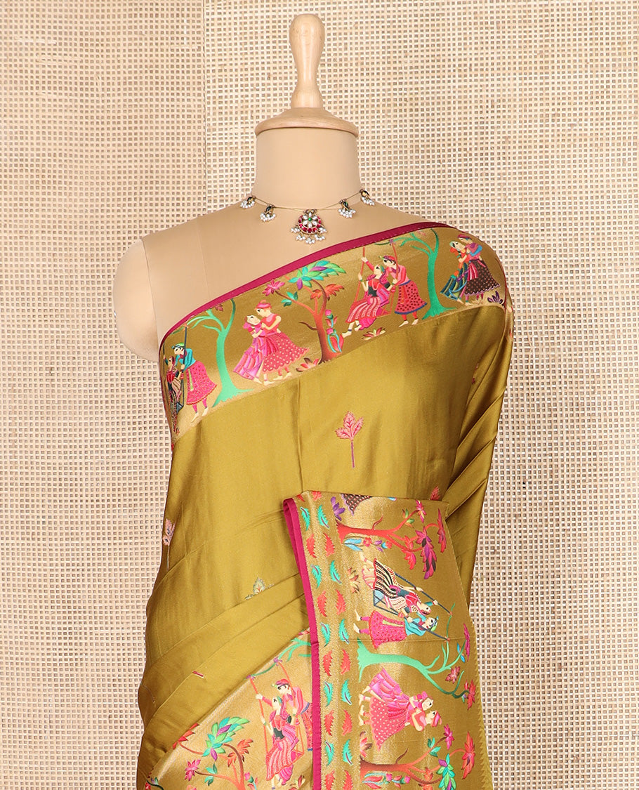 Green unique motifs printed dola silk saree, gleaming zari border, and pallu of Mughal-style man and women motifs